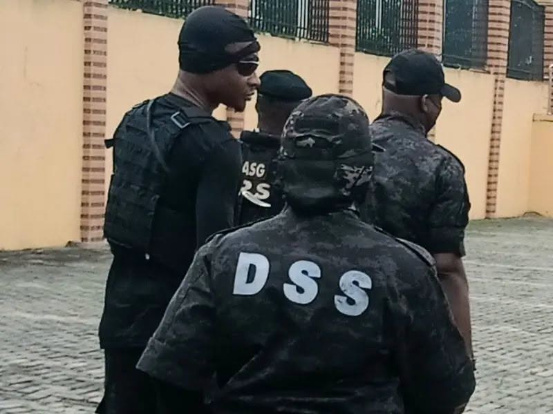 DSS officers patrolling outside a secure facility in Nigeria.